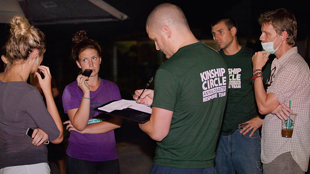 IC George McKeehan, with rescued dogs at shelter, works past midnight with team members and Save Elephant Foundation, (c) Kinship Circle