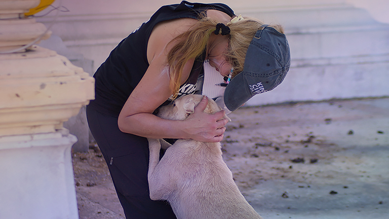 Brenda Shoss gets dog luv (c) Kinship Circle